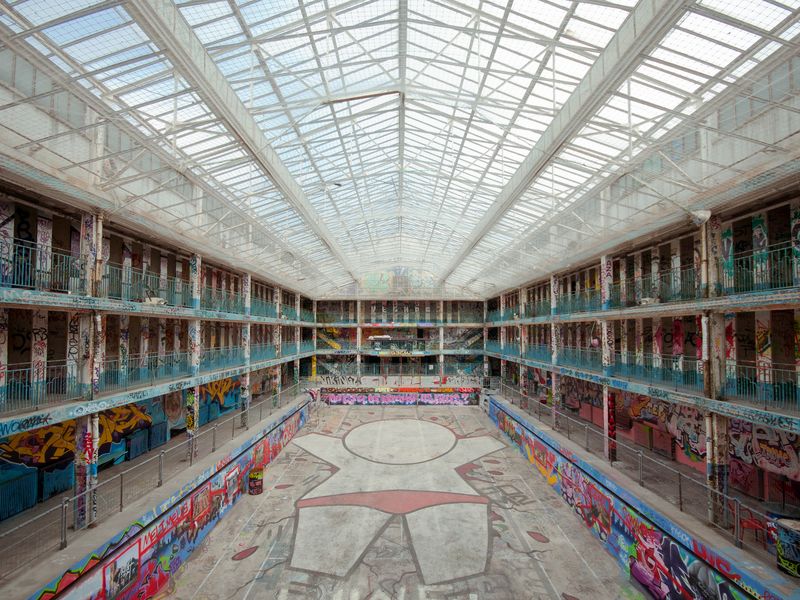 The abandoned Piscine Molitor, its walls covered in graffiti